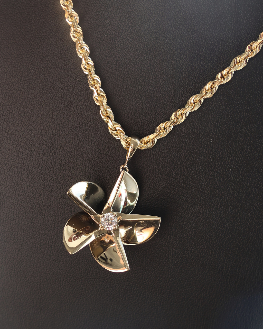 14 karat yellow gold and natural diamond Large Hering Propeller